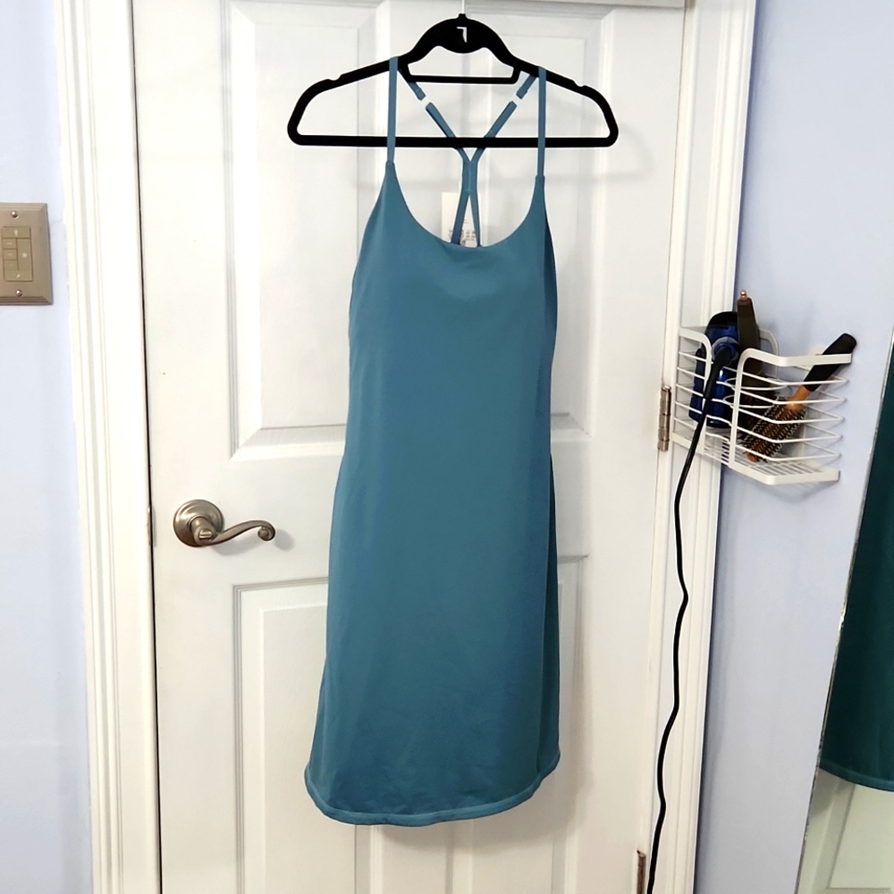 Halara athletic dress adjustable straps and longer with short underneath. SIZE M